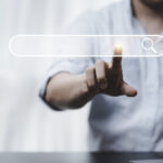 Hand pointing to search bar