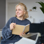 Smiling woman creating UGC