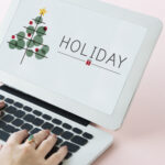 Laptop screen with holiday banner