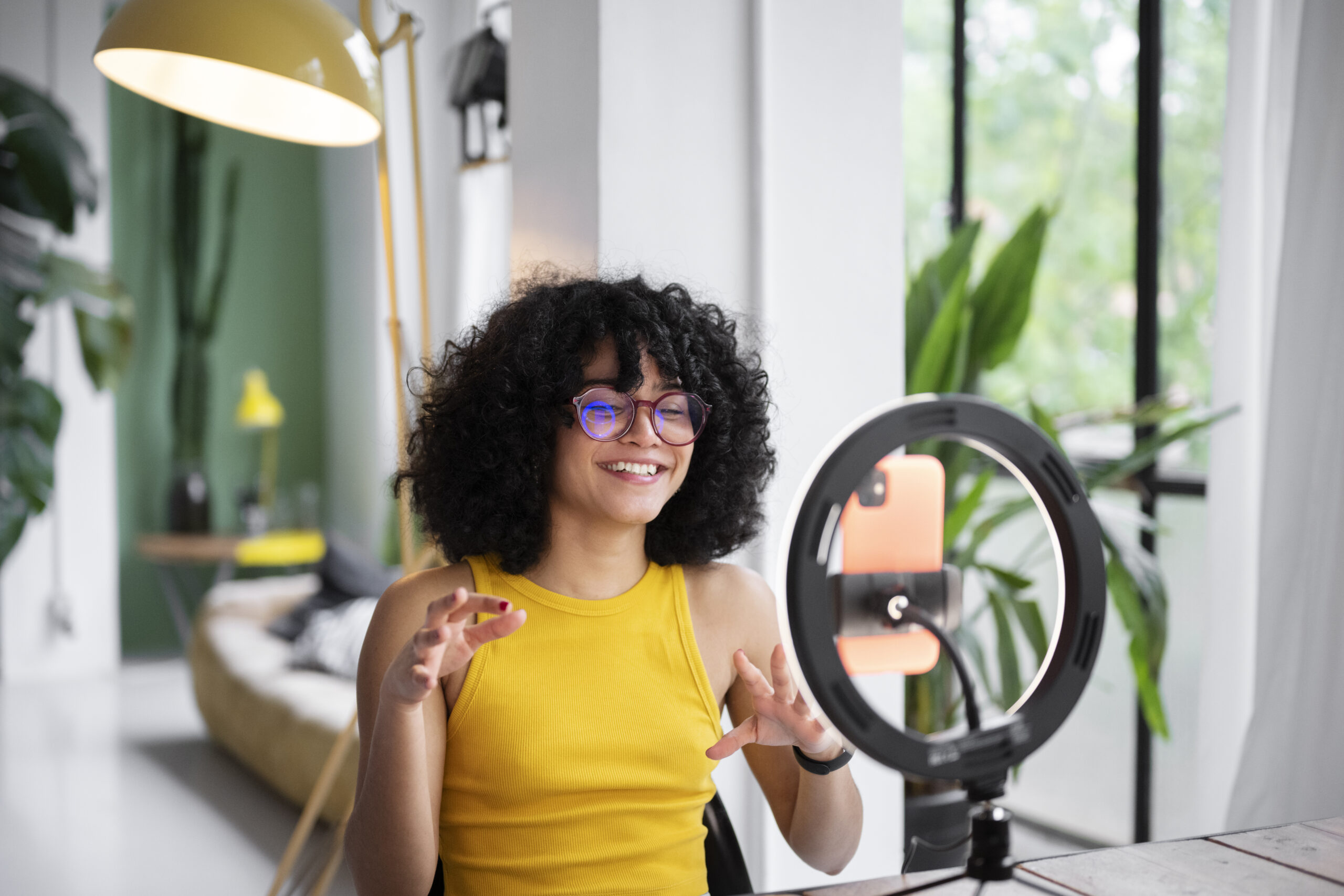 Influencer sitting in front of ring light