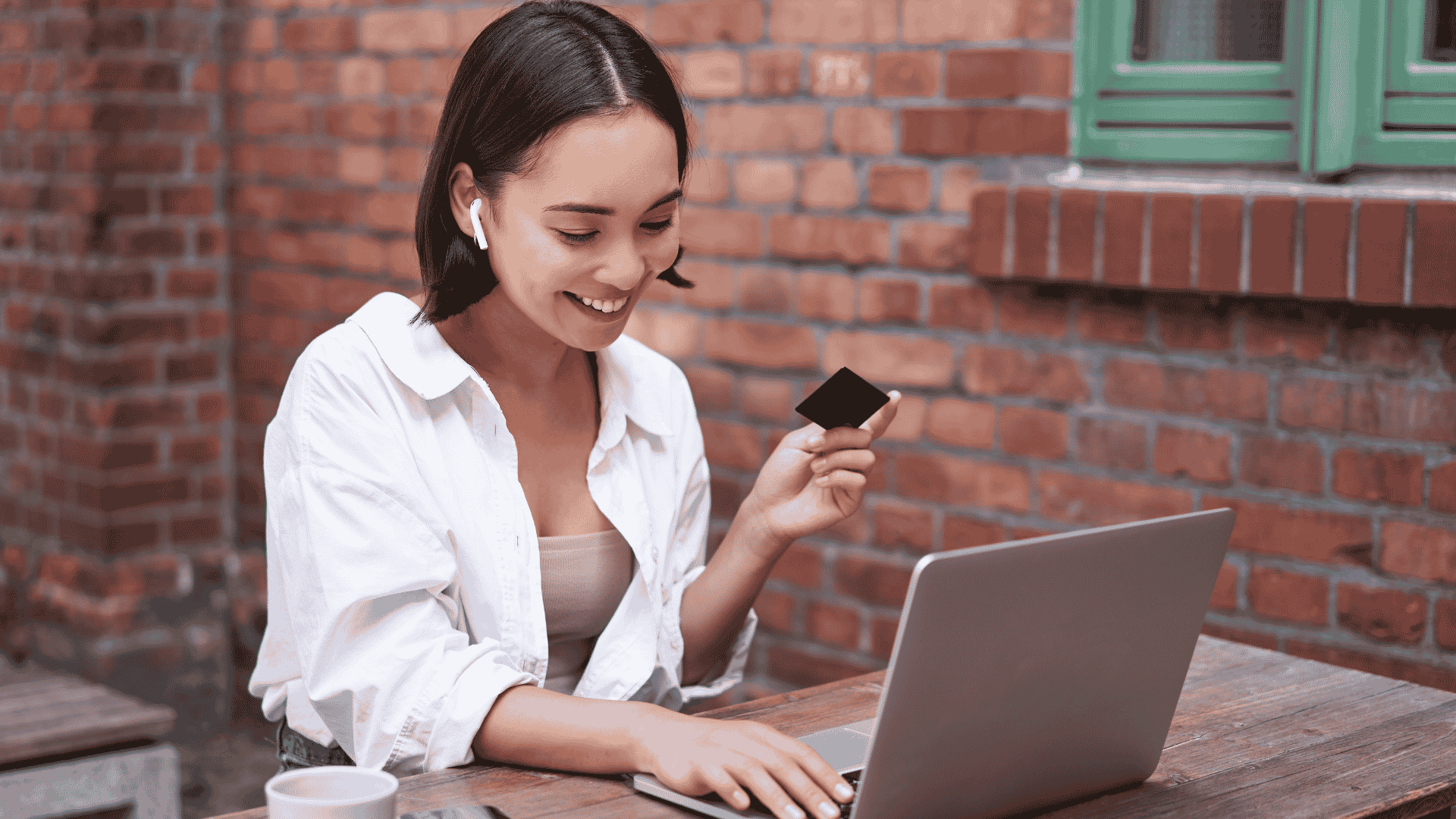 Woman shopping on laptop