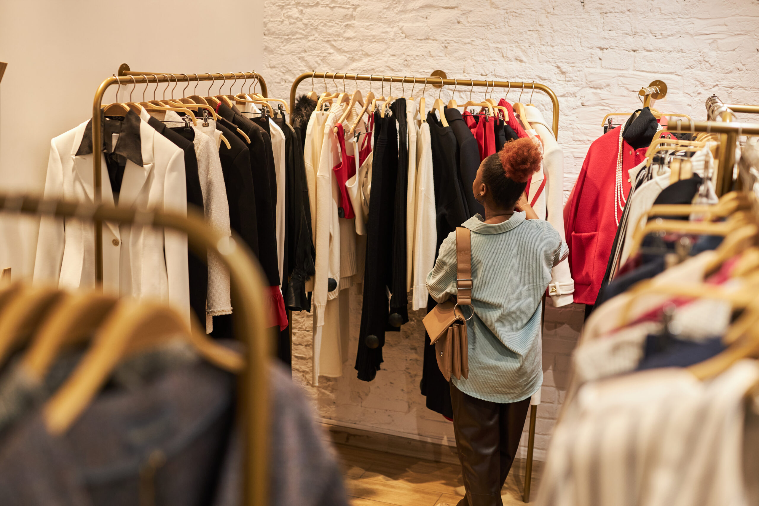 woman shopping in clothing store