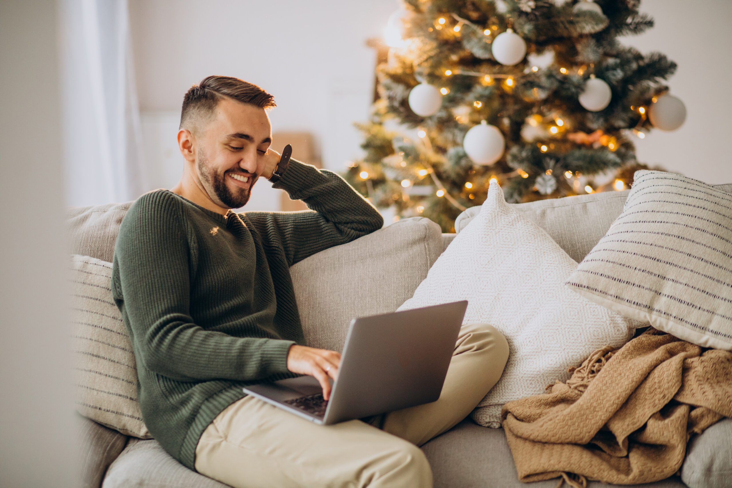 man shopping on laptop